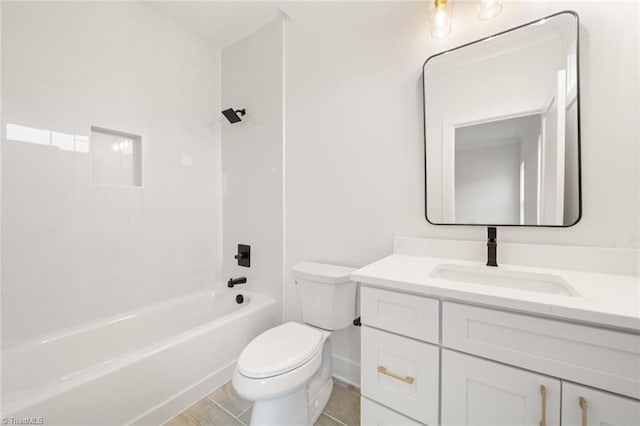 bathroom with toilet, vanity, and washtub / shower combination