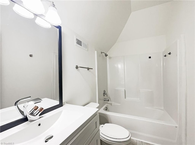 full bath with visible vents, toilet, vaulted ceiling, vanity, and  shower combination