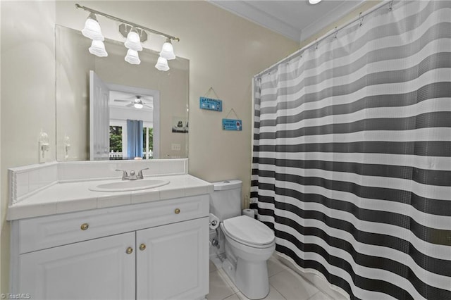 full bathroom featuring ornamental molding, toilet, ceiling fan, vanity, and tile patterned flooring