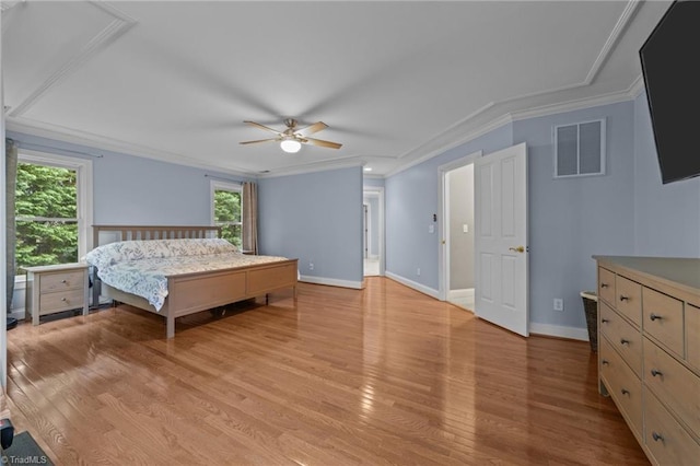 bedroom with visible vents, baseboards, ceiling fan, crown molding, and light wood finished floors