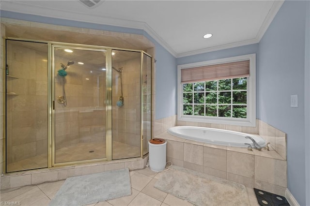 bathroom with a shower stall, tile patterned floors, and a bath