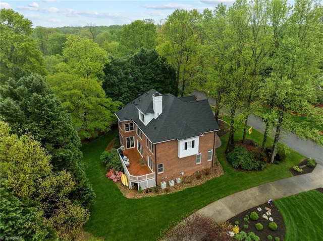 drone / aerial view with a view of trees