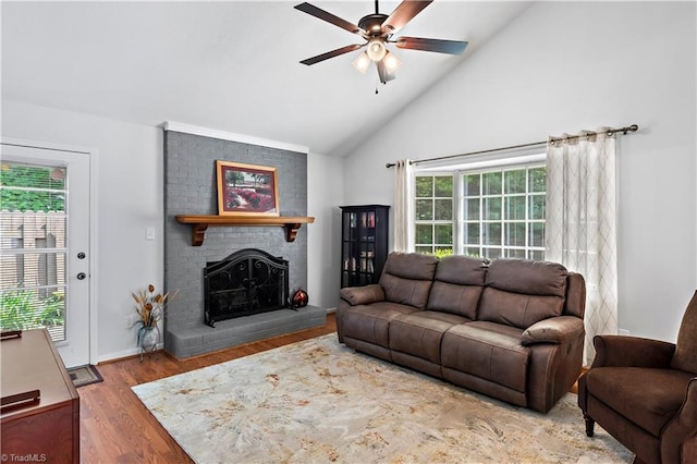 143 Chrisfield Cir, Winston-Salem, NC 27104 - living area with ceiling fan, a fireplace, plenty of natural light, wood finished floors, and high vaulted ceiling