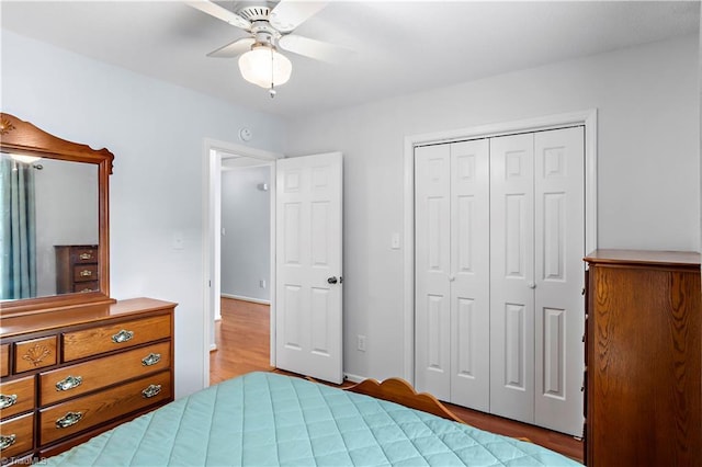 143 Chrisfield Cir, Winston-Salem, NC 27104 - bedroom featuring light wood-type flooring, a closet, and a ceiling fan