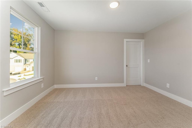 view of carpeted spare room