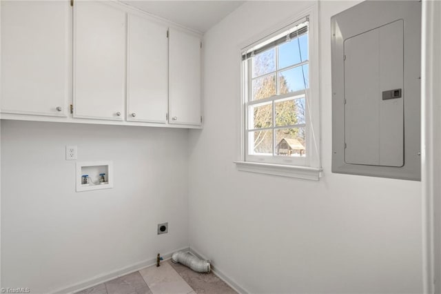 clothes washing area featuring cabinets, electric dryer hookup, electric panel, hookup for a washing machine, and light tile patterned floors