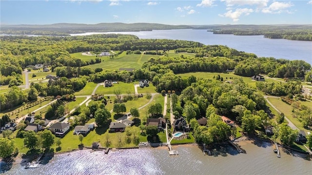 aerial view of property's location with a nearby body of water