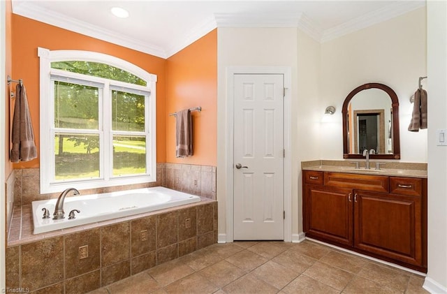 bathroom with a bath, ornamental molding, vanity, tile patterned floors, and baseboards