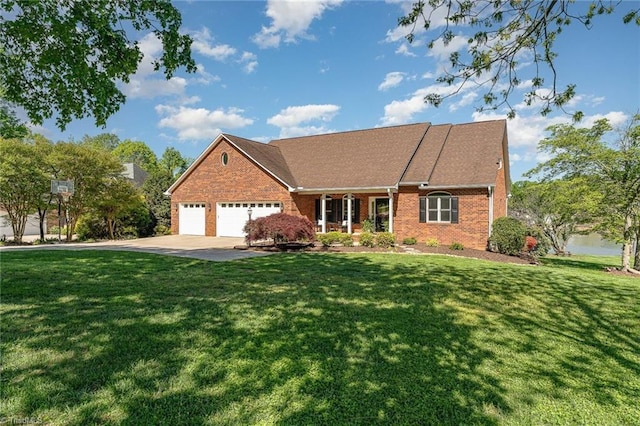 view of front of home featuring an attached garage, a front yard, driveway, brick siding, and covered porch