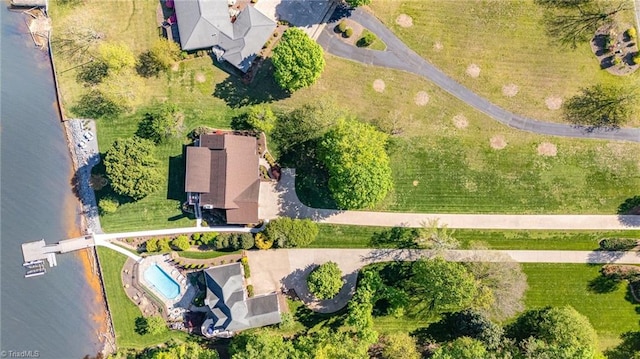 view of property location with a pool