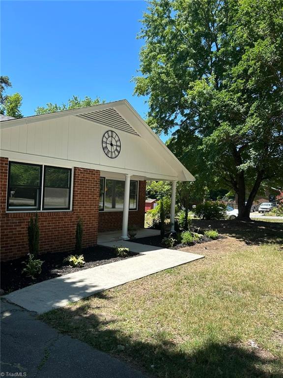 exterior space with a front yard