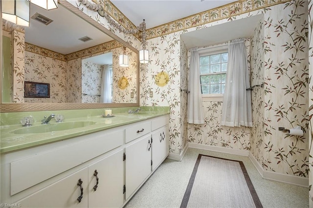 4630 Woodleaf Rd, Salisbury, NC 28147 - bathroom with wallpapered walls and double vanity