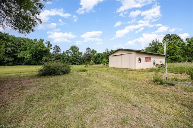 4630 Woodleaf Rd, Salisbury, NC 28147 - view of green lawn featuring a pole building and an outbuilding