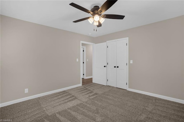 unfurnished bedroom featuring carpet flooring, a closet, and ceiling fan