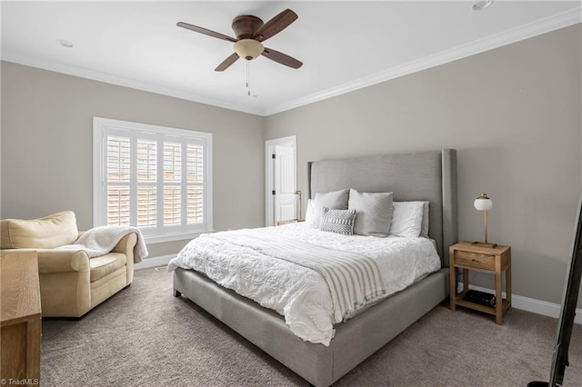 carpeted bedroom featuring ceiling fan and ornamental molding