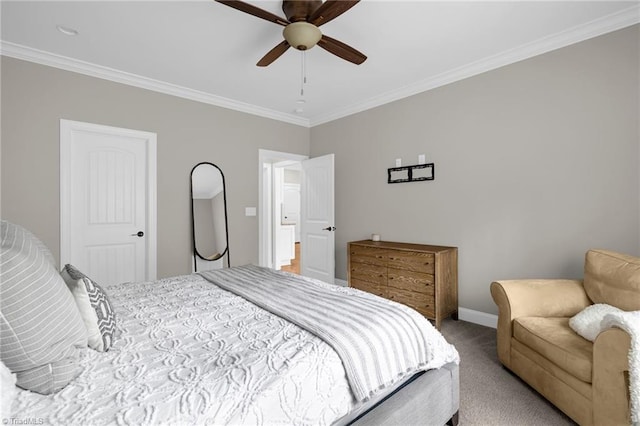 bedroom featuring crown molding, ceiling fan, and carpet