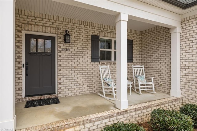 entrance to property with a porch