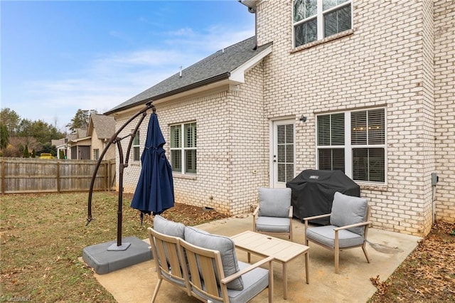 view of patio with a grill and outdoor lounge area