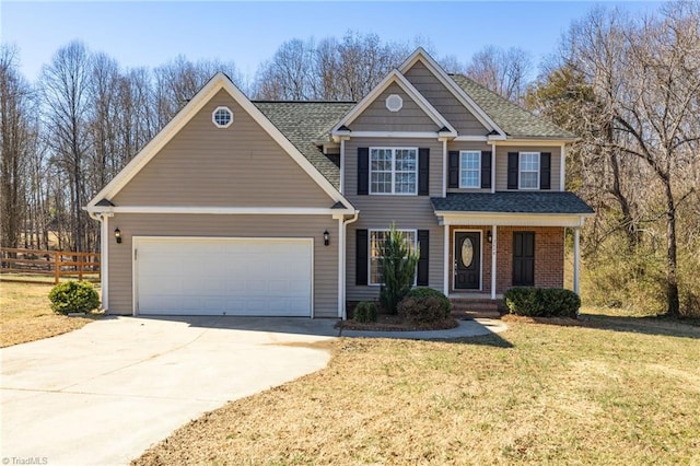 view of front of home with fence, a front yard, roof with shingles, concrete driveway, and an attached garage