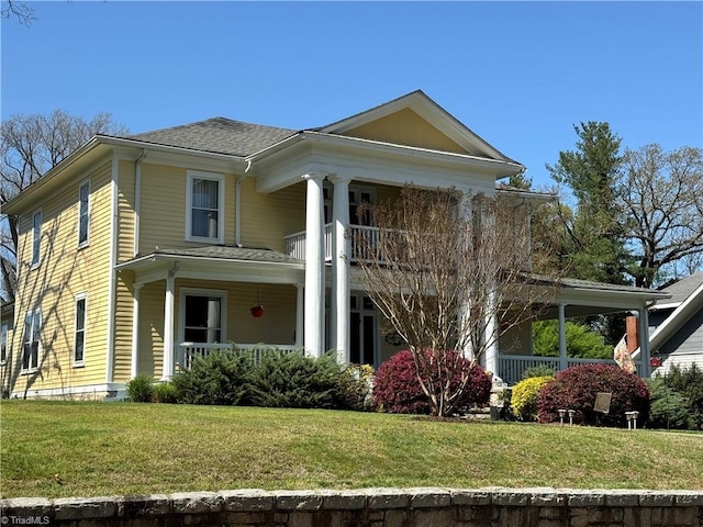 311 Cherry St, Mount Airy, NC 27030 - greek revival inspired property with covered porch, a front lawn, and a balcony