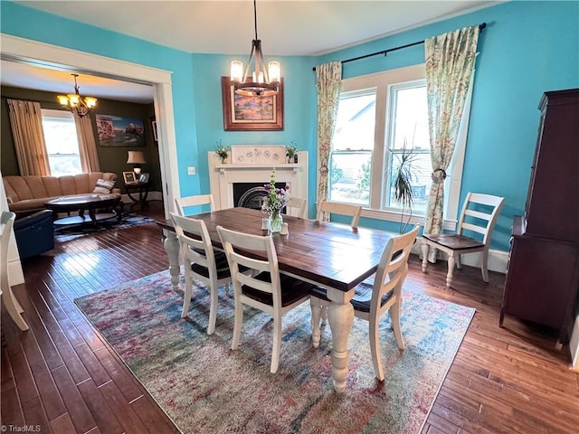 311 Cherry St, Mount Airy, NC 27030 - dining space featuring a chandelier, healthy amount of natural light, and wood-type flooring