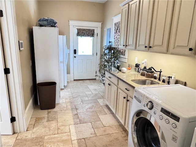311 Cherry St, Mount Airy, NC 27030 - laundry room featuring washer / dryer, cabinet space, stone tile flooring, and baseboards