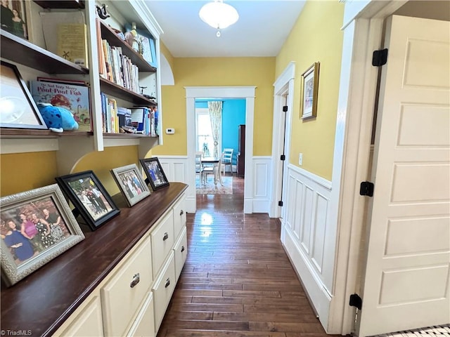 311 Cherry St, Mount Airy, NC 27030 - hall featuring wainscoting, dark wood finished floors, and a decorative wall