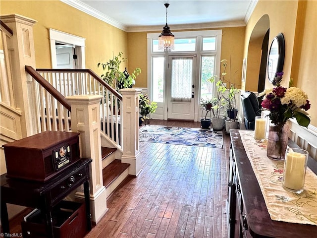 311 Cherry St, Mount Airy, NC 27030 - foyer featuring dark wood-style floors, ornamental molding, stairs, and arched walkways