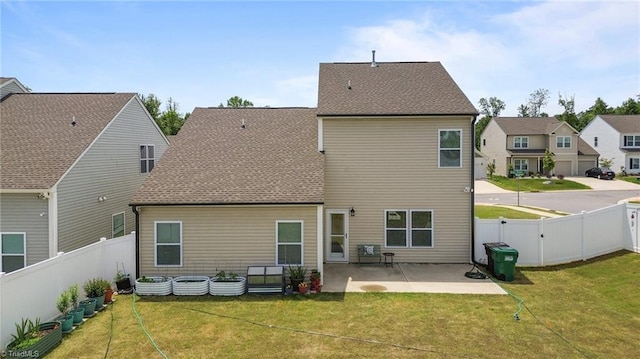 back of house with a patio area, roof with shingles, and a residential view