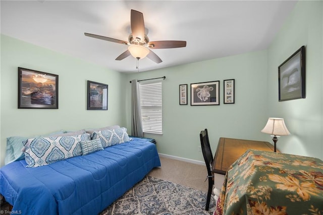 bedroom with carpet floors, baseboards, and ceiling fan