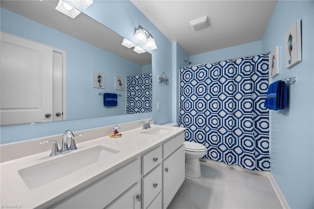 bathroom with toilet, a shower with shower curtain, tile patterned flooring, and double vanity