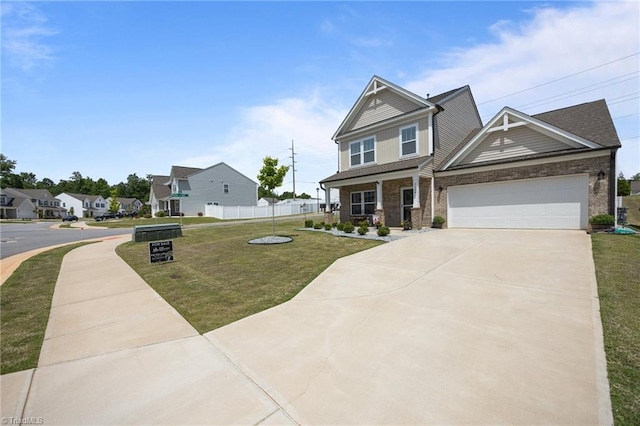 craftsman house with driveway, an attached garage, and brick siding