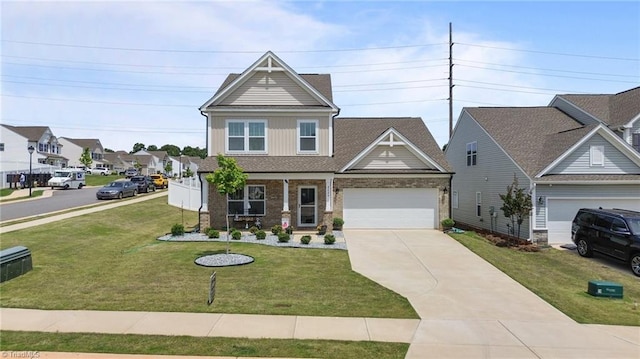 craftsman house with a garage, concrete driveway, a front yard, and brick siding