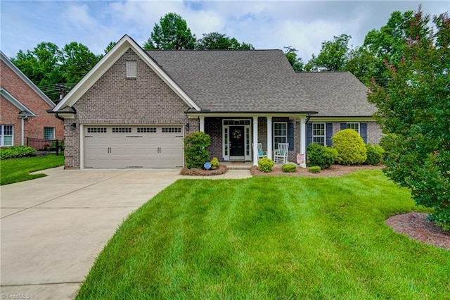 4240 Prestwick Xing, Winston-Salem, NC 27106 - view of front of property with brick siding, concrete driveway, a garage, and a front lawn