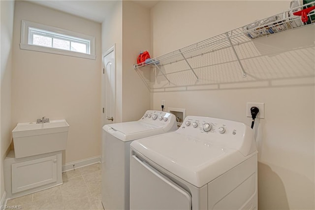 4240 Prestwick Xing, Winston-Salem, NC 27106 - laundry area with washer and clothes dryer, baseboards, and light tile patterned flooring