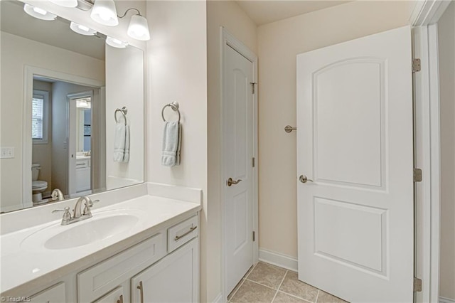 4240 Prestwick Xing, Winston-Salem, NC 27106 - bathroom featuring toilet, vanity, tile patterned flooring, and baseboards