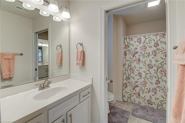 4240 Prestwick Xing, Winston-Salem, NC 27106 - full bathroom featuring vanity, toilet, tile patterned floors, and a shower with shower curtain