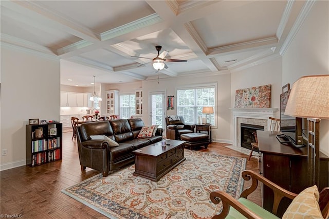 4240 Prestwick Xing, Winston-Salem, NC 27106 - living room with a ceiling fan, wood finished floors, baseboards, beamed ceiling, and a tile fireplace