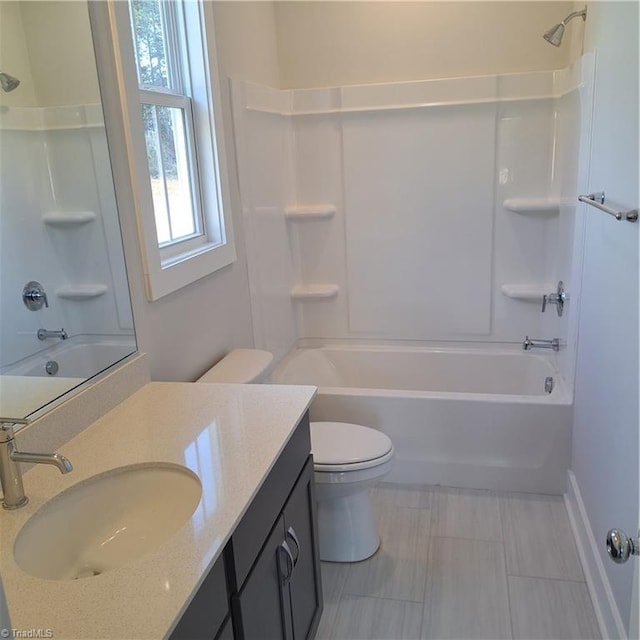 full bathroom with toilet, vanity, and bathing tub / shower combination