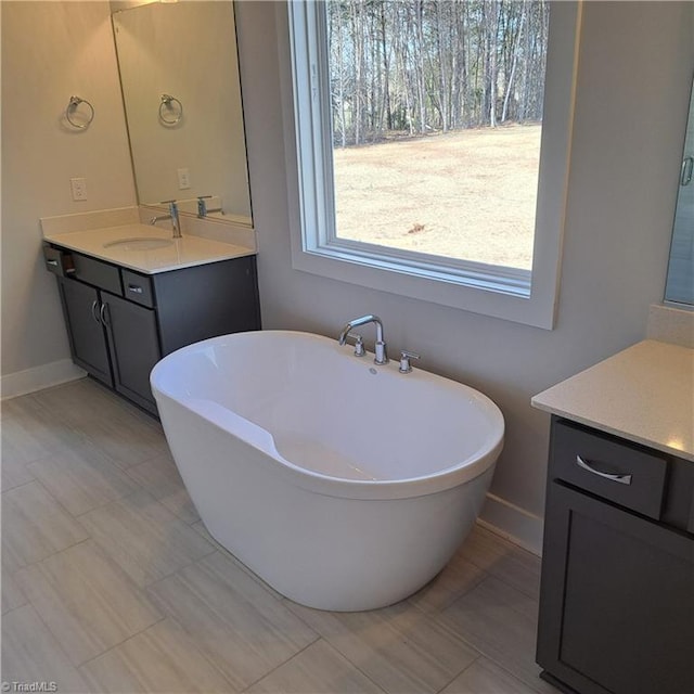 bathroom featuring a bathtub and vanity