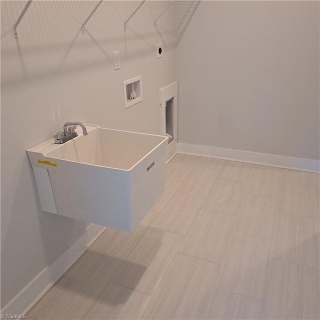 washroom with washer hookup and hookup for an electric dryer