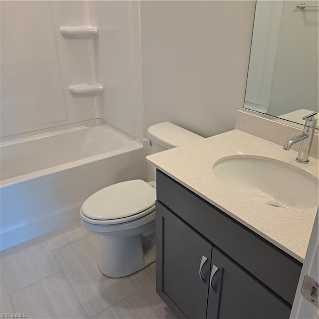 full bathroom featuring toilet, vanity, and shower / bathing tub combination