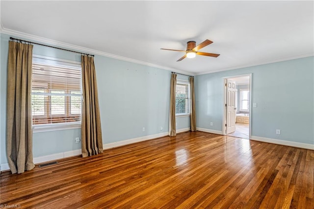 spare room featuring ceiling fan, ornamental molding, and hardwood / wood-style floors