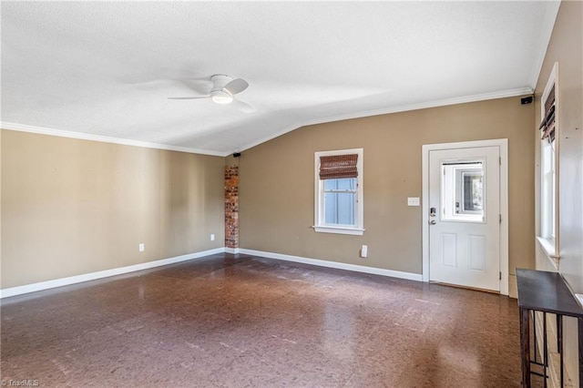 unfurnished room featuring vaulted ceiling, ornamental molding, and ceiling fan