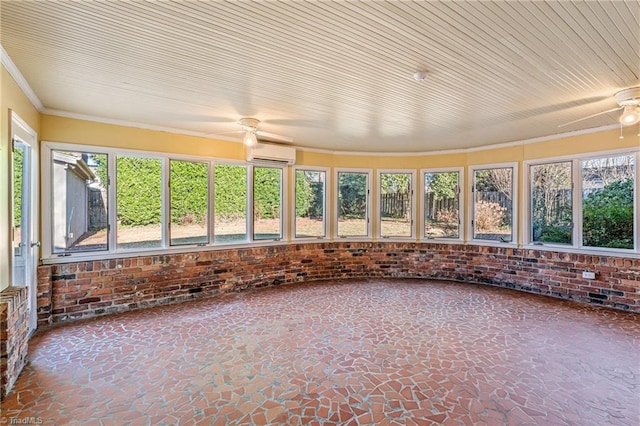 unfurnished sunroom featuring a wall mounted AC and ceiling fan