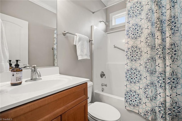 bathroom featuring vanity, ornamental molding, shower / bath combination with curtain, and toilet