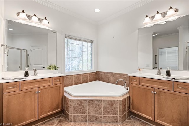 bathroom with a sink, two vanities, a shower stall, ornamental molding, and a bath