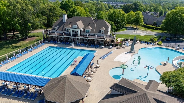 community pool featuring a patio area