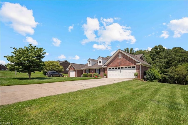 149 Royal View Dr Unit 1, Pinnacle, NC 27043 - view of front of home featuring brick siding, driveway, a front lawn, and a garage