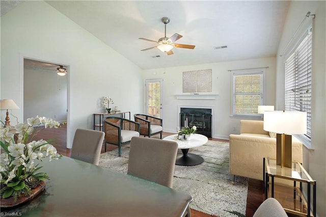 149 Royal View Dr Unit 1, Pinnacle, NC 27043 - living area featuring ceiling fan, vaulted ceiling, a fireplace, wood finished floors, and plenty of natural light